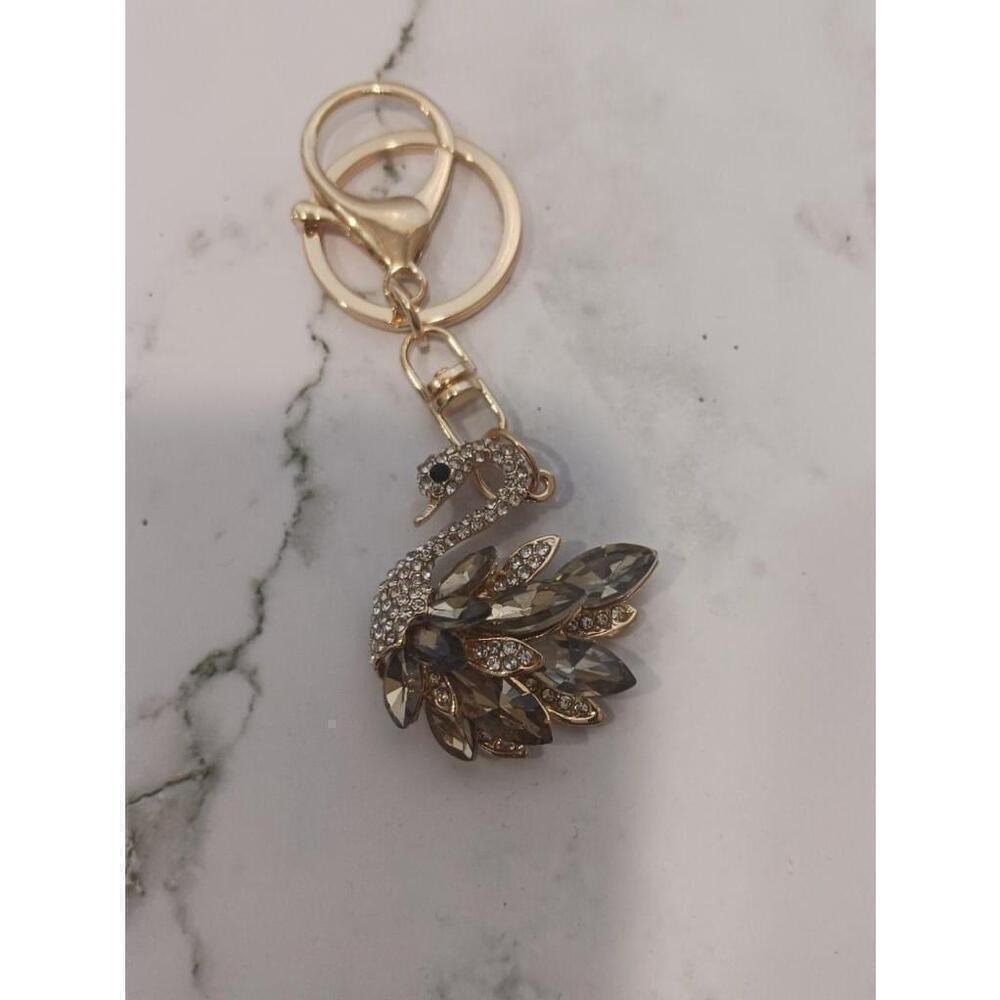 Swan Shaped Keychain In Gold - Picture 4 of 9